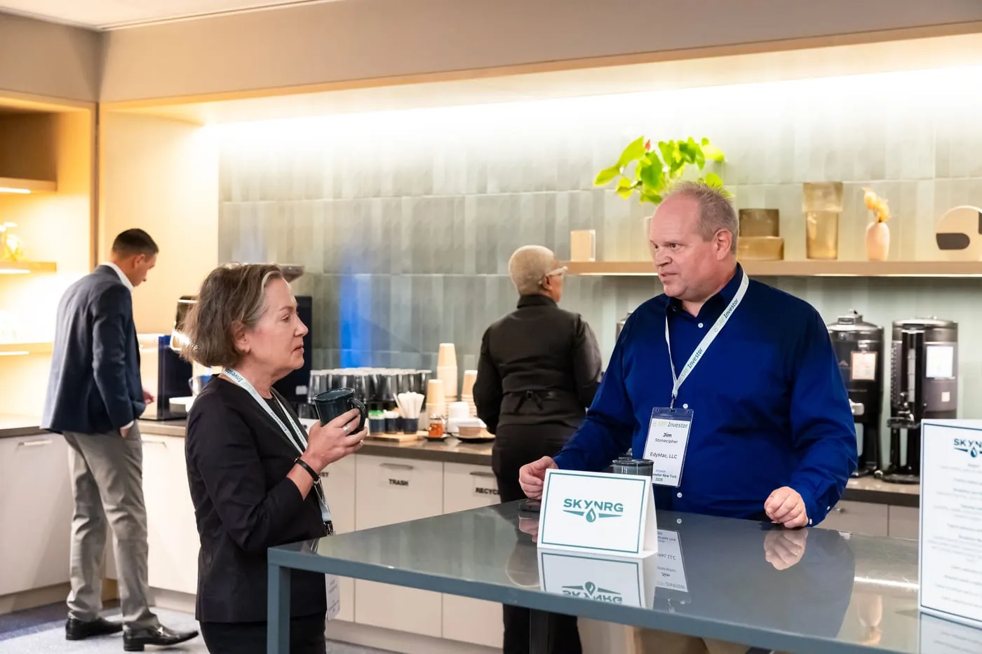 EDYMAC consultants in discussion at SAF Investor NYC conference